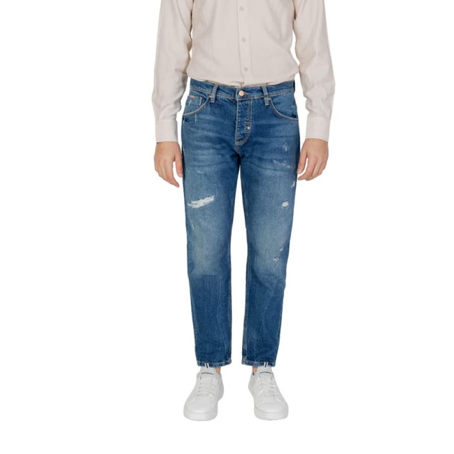 Young boy modeling Antony Morato men jeans and white shirt