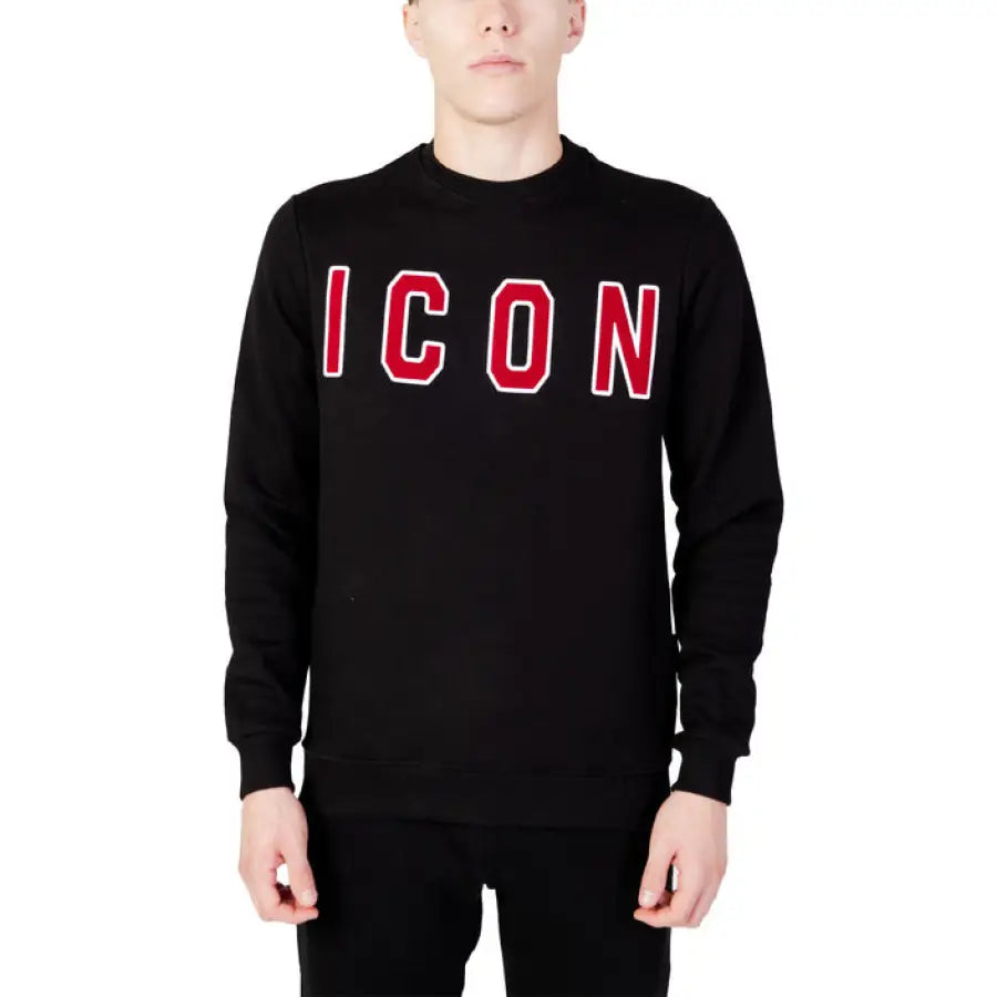 
                      
                        Young man in Icon brand black sweater showcasing urban city style fashion
                      
                    